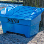 Blå box med sand