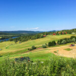 Vy över kuperat jordbrukslandskap